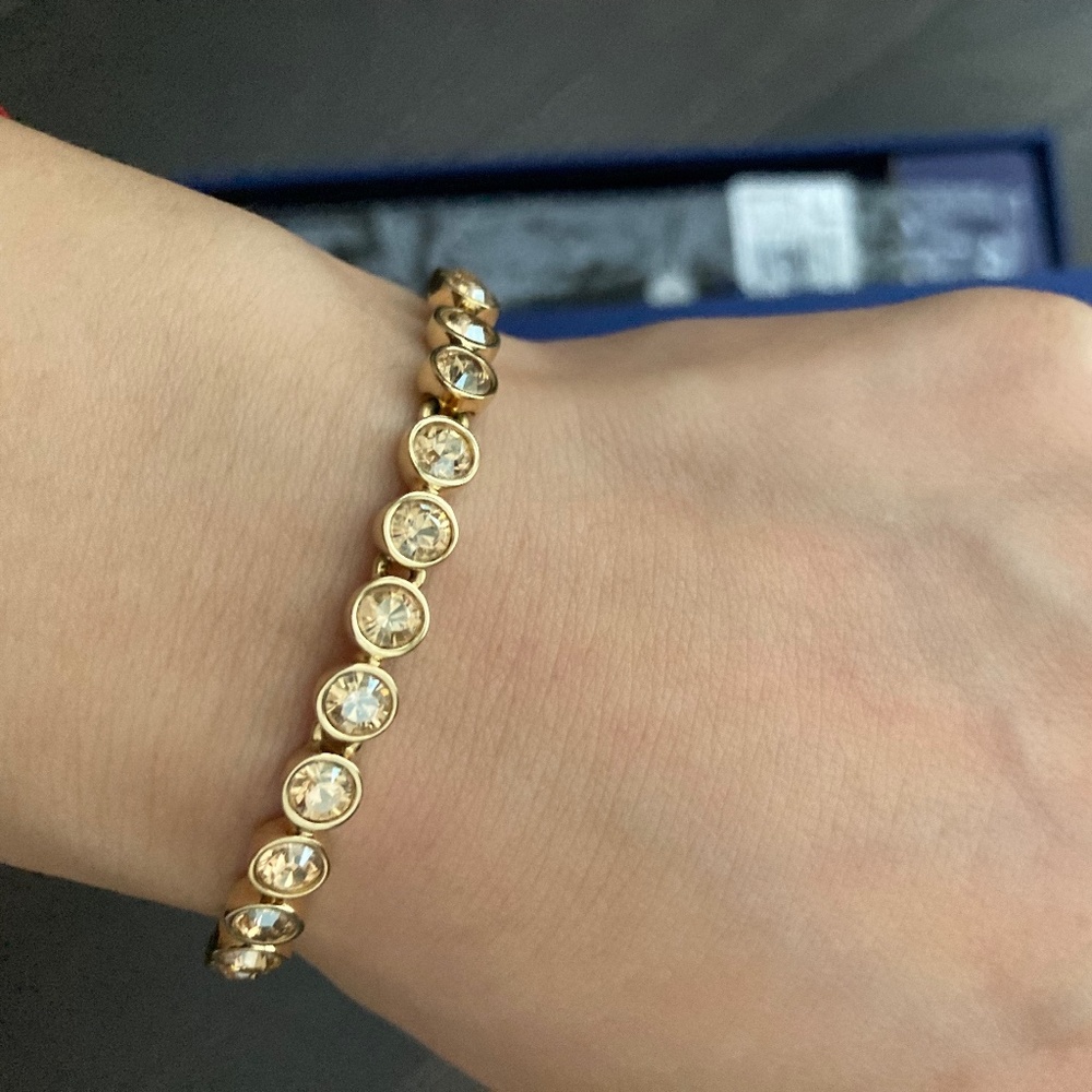 Swarovski Beautiful golden color with crystal bracelet with original box